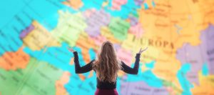 woman from behind looking at a map